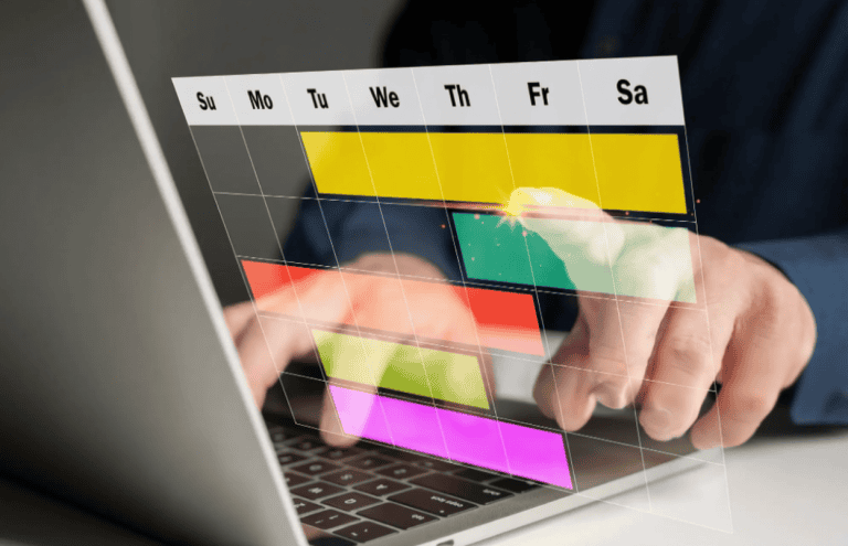 Man using a digital planner app on a laptop
