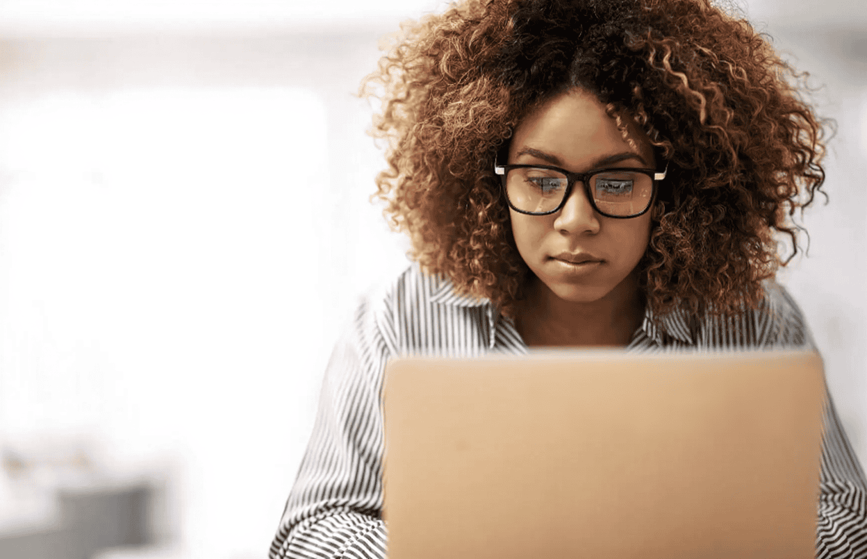 Black woman searching for the best content creation apps