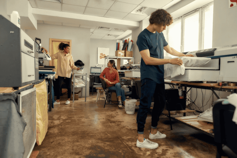 Entrepreneur Making T-Shirts in a Shop