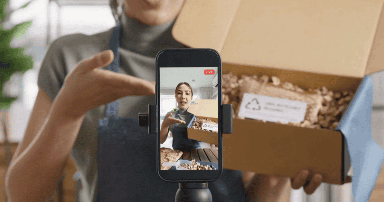 Asian woman shooting a video for her ecommerce site