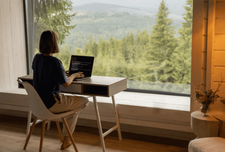 Woman working a non phone work from home job on her laptop