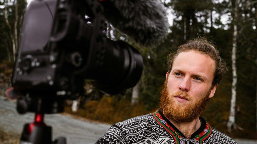 YouTuber creating a video outdoors